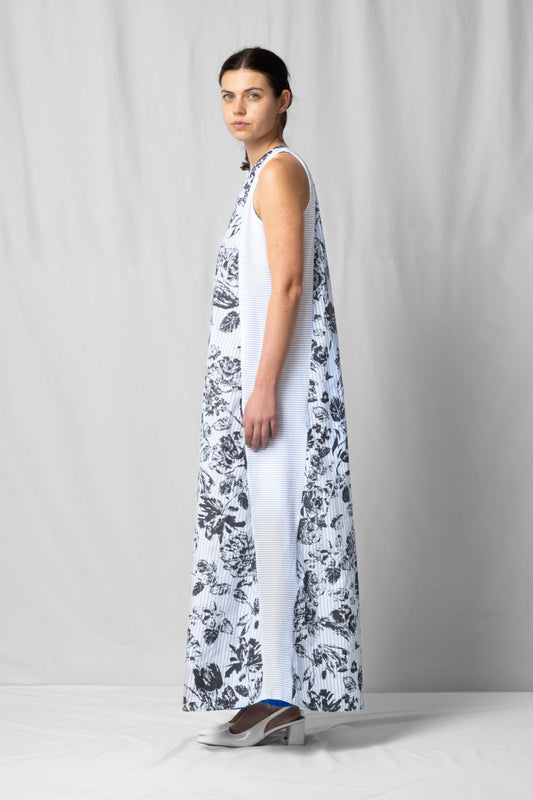 long, wide black flowers halter dress with a two-fabric detail and button fastening at the back from the SS26 collection by STEF SERIES