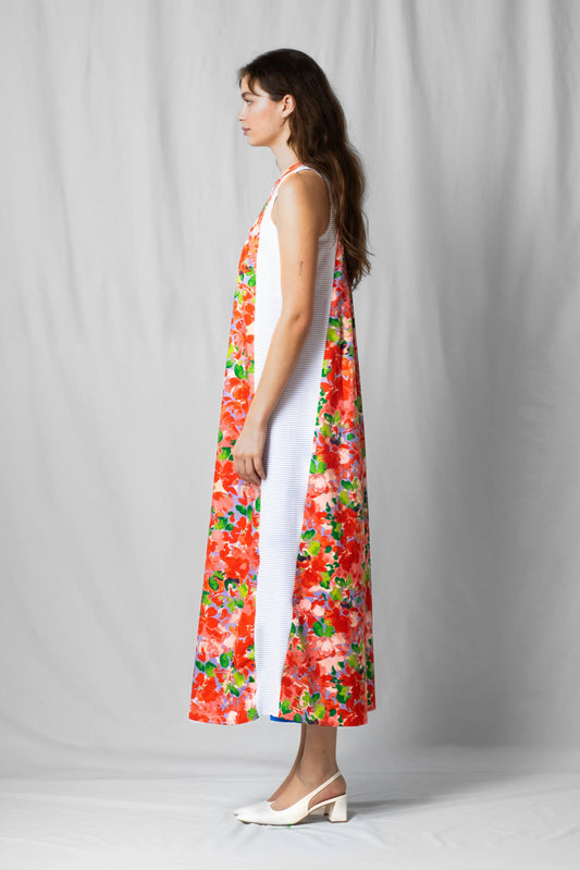 long, wide pink flowers halter dress with a two-fabric detail and button fastening at the back from the SS26 collection by STEF SERIES