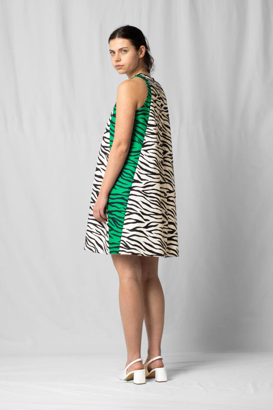 Short, wide white zebra halter dress with a two-fabric detail and button fastening at the back from the SS26 collection by STEF SERIES