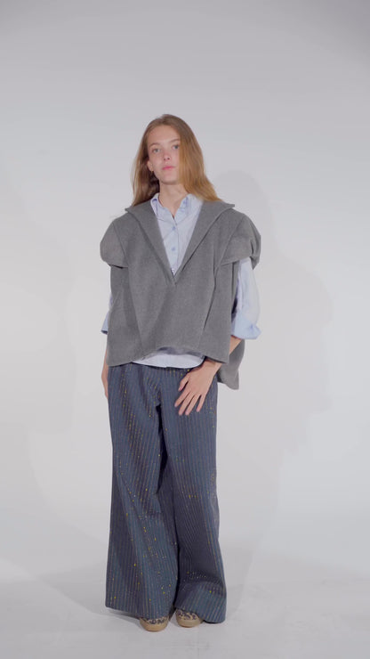 Video of model showing Aiko grey wool vest top women with Ash denim pants with gold studs from STEF SERIES AW25.