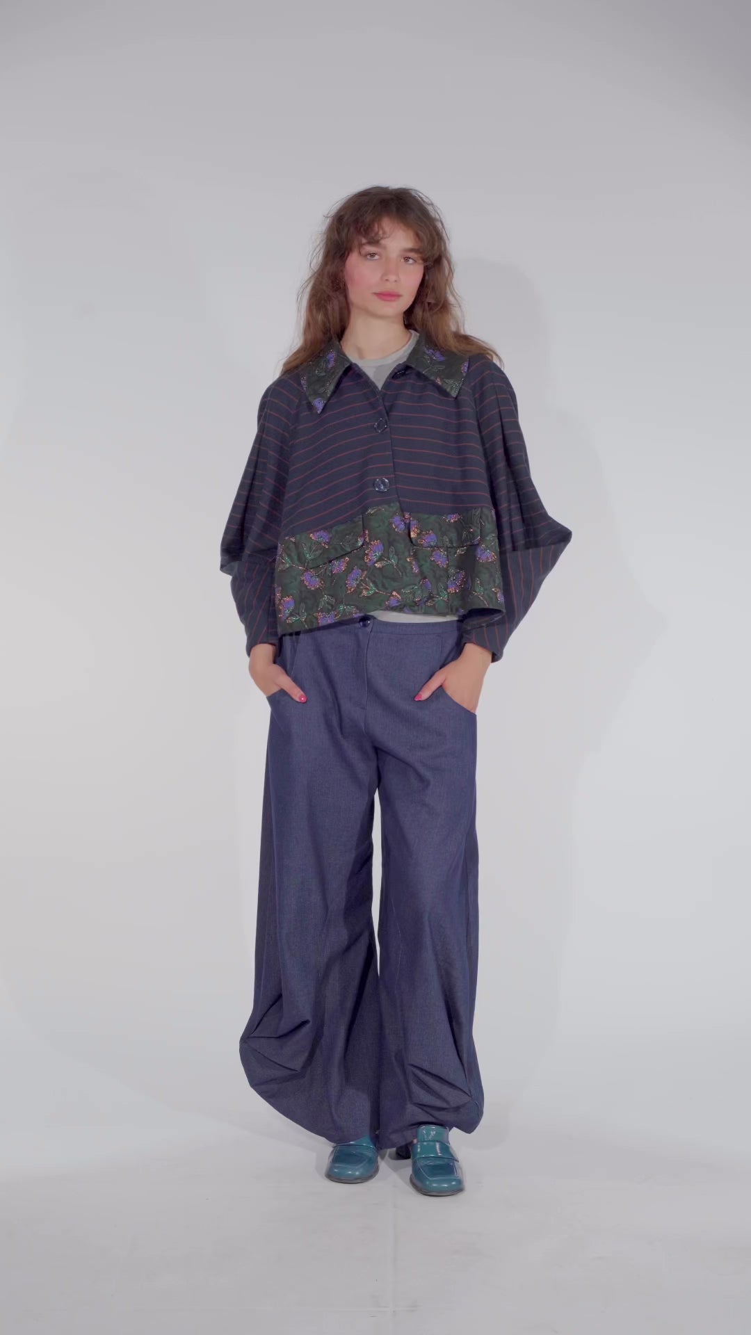 Video of Model showing womens statement jacket Abel nightblue, AW25 collection by STEF SERIES.