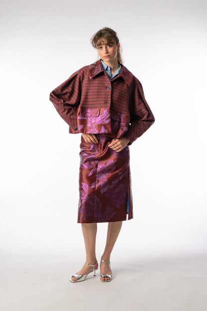 Abel boxy short jacket and Asil skirt in bordeaux with florals, AW25 collection by STEF SERIES, shown from front.