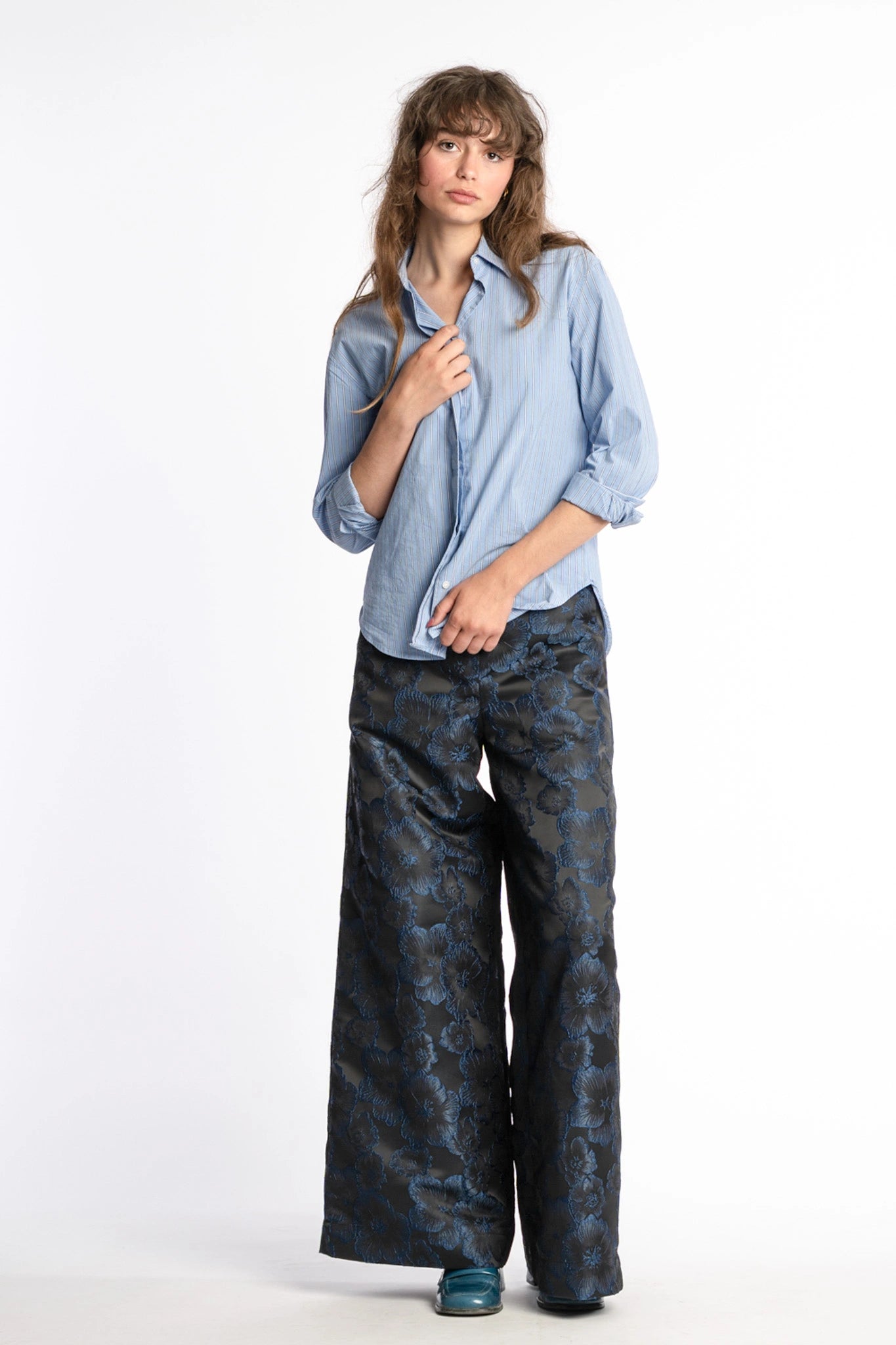 Floral trousers women Ash in black and blue from STEF SERIES AW25, shown from front.