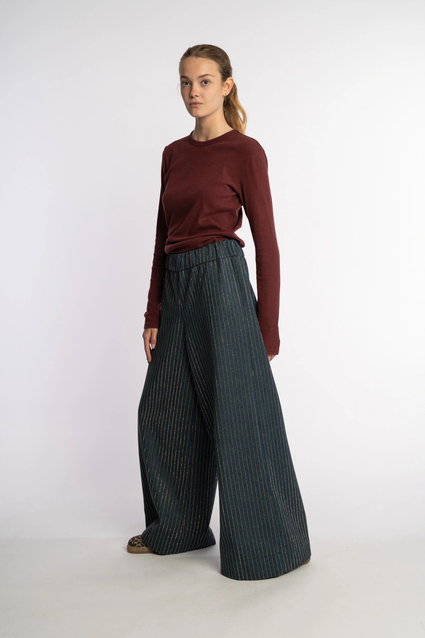 Dark denim pants Ash with gold studs from the STEF SERIES Autumn Winter Collection 2025, shown from front.