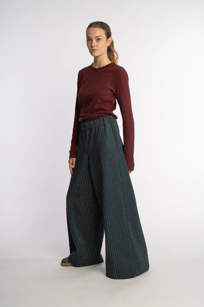 Dark denim pants Ash with gold studs from the STEF SERIES Autumn Winter Collection 2025, shown from front.