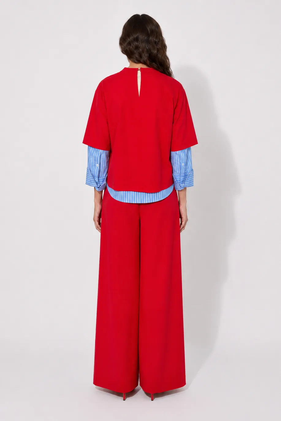 Back view of the STEF SERIES Caro wide-leg pants in a red velvet.