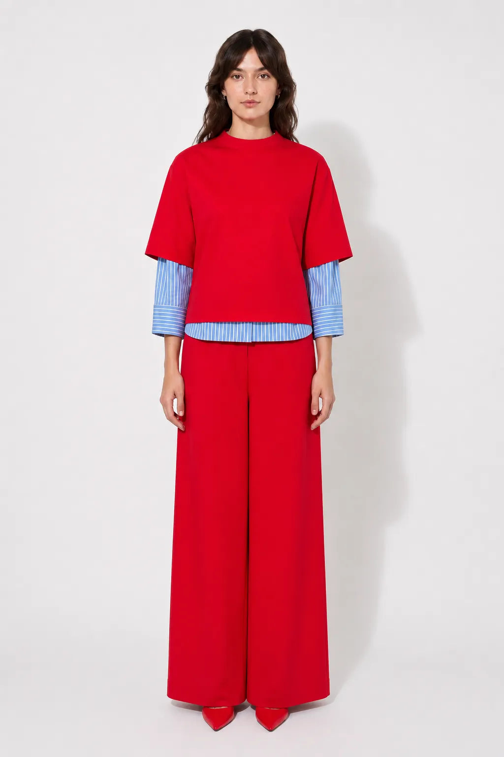 Front view of the STEF SERIES Caro wide-leg pants in a red velvet.