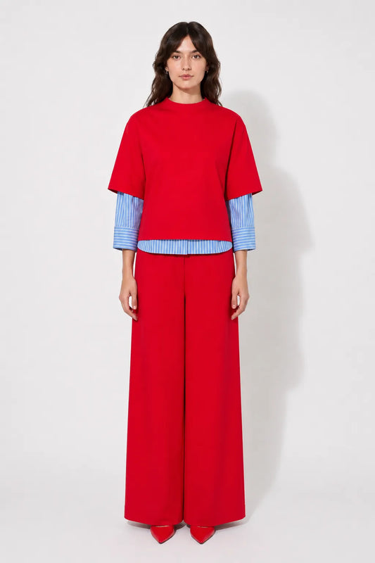 Front view of the STEF SERIES Caro wide-leg pants in a red velvet.
