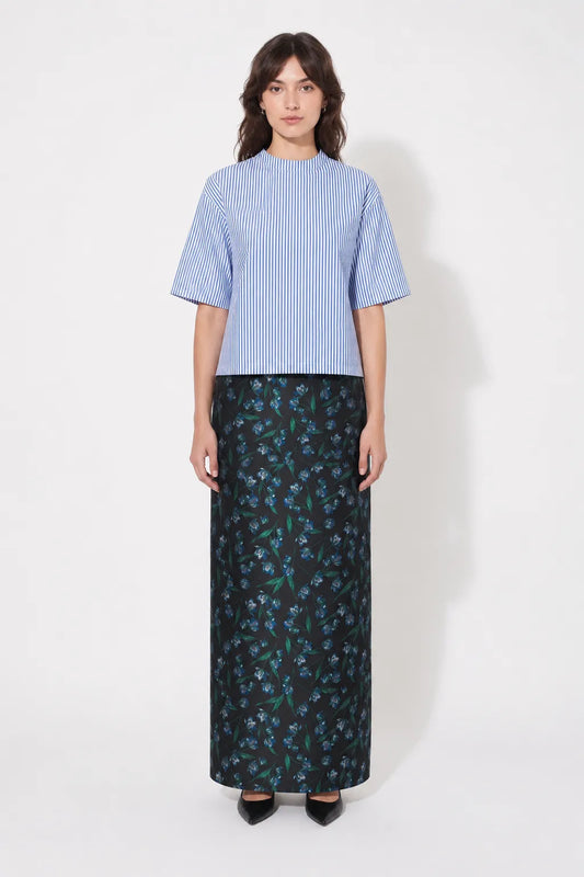 Front view of the STEF SERIES Cas maxi skirt in blue floral print. 