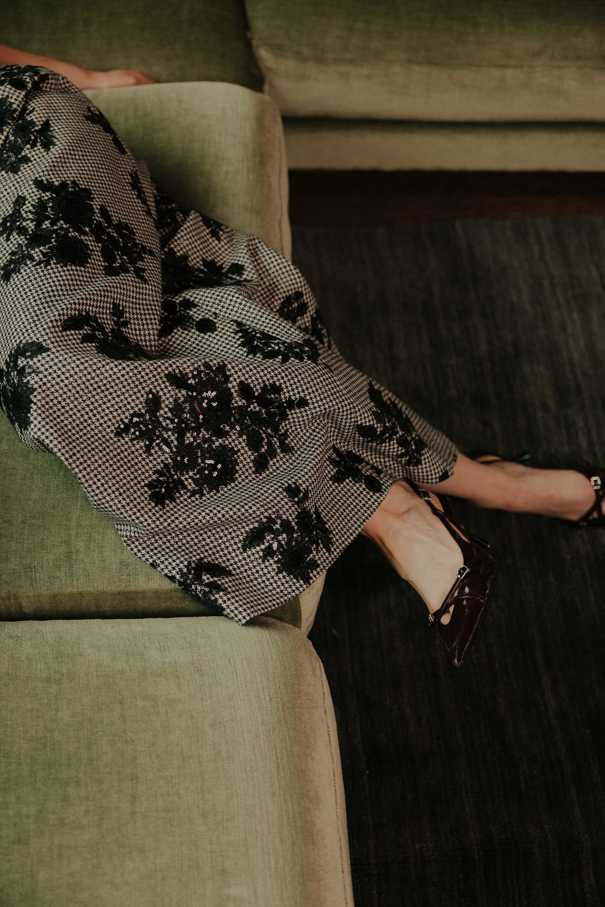 Model wearing the STEF SERIES Cas maxi skirt in pied-de-poule fabric from the Autumn Winter 2026 Collection.