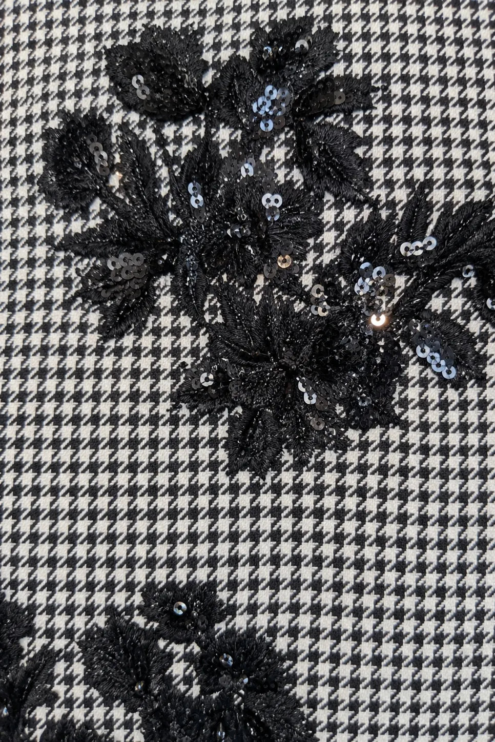 Close-up of the pied-de-poule fabric on the STEF SERIES Cenny mini dress.