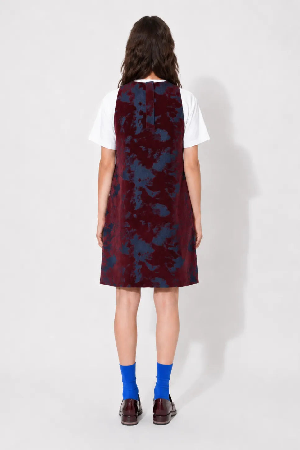 Back view of the STEF SERIES Cenny sleeveless mini dress in bordeaux velvet denim.