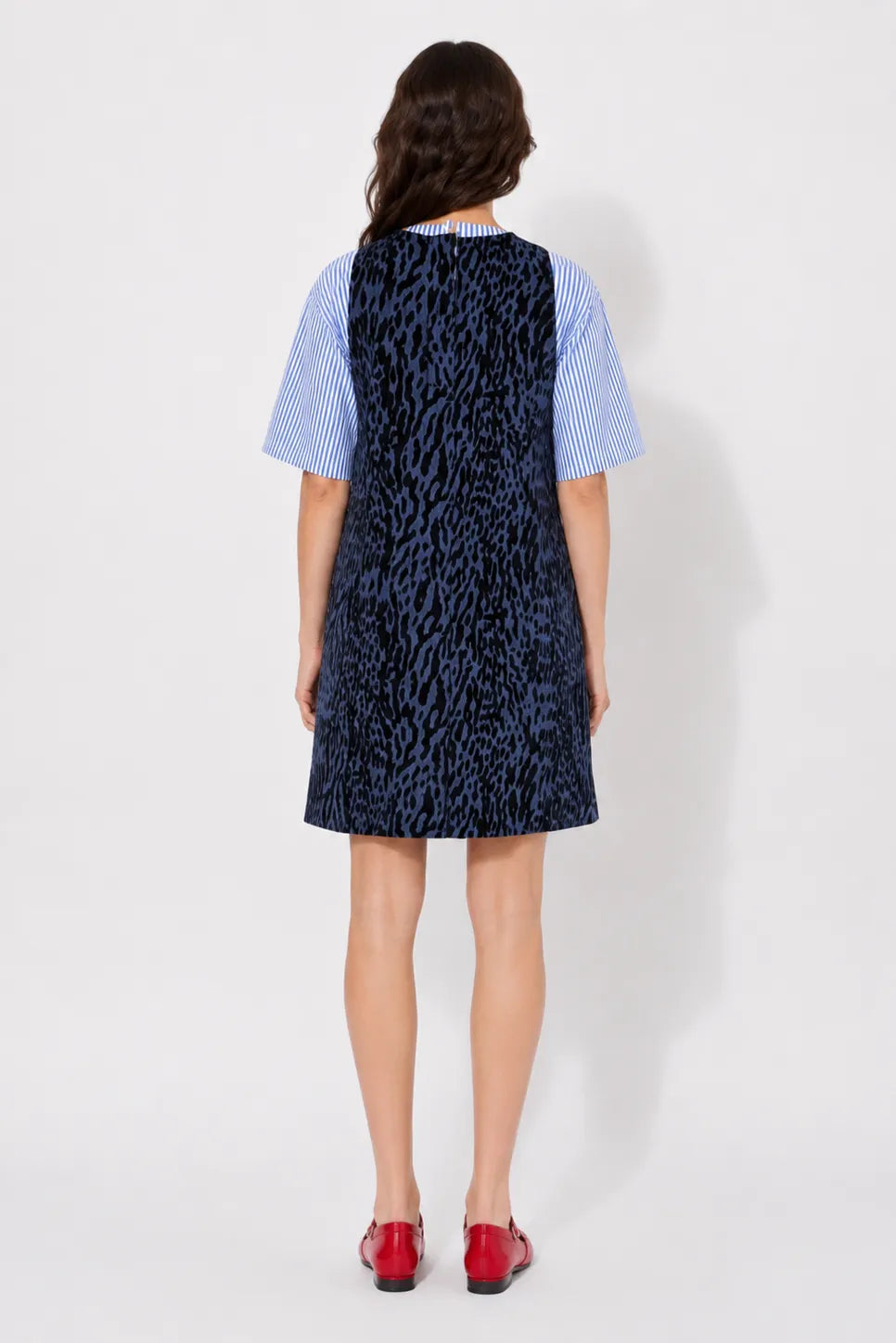 Back view of the STEF SERIES Cenny sleeveless mini dress in denim with velvet leopard print.