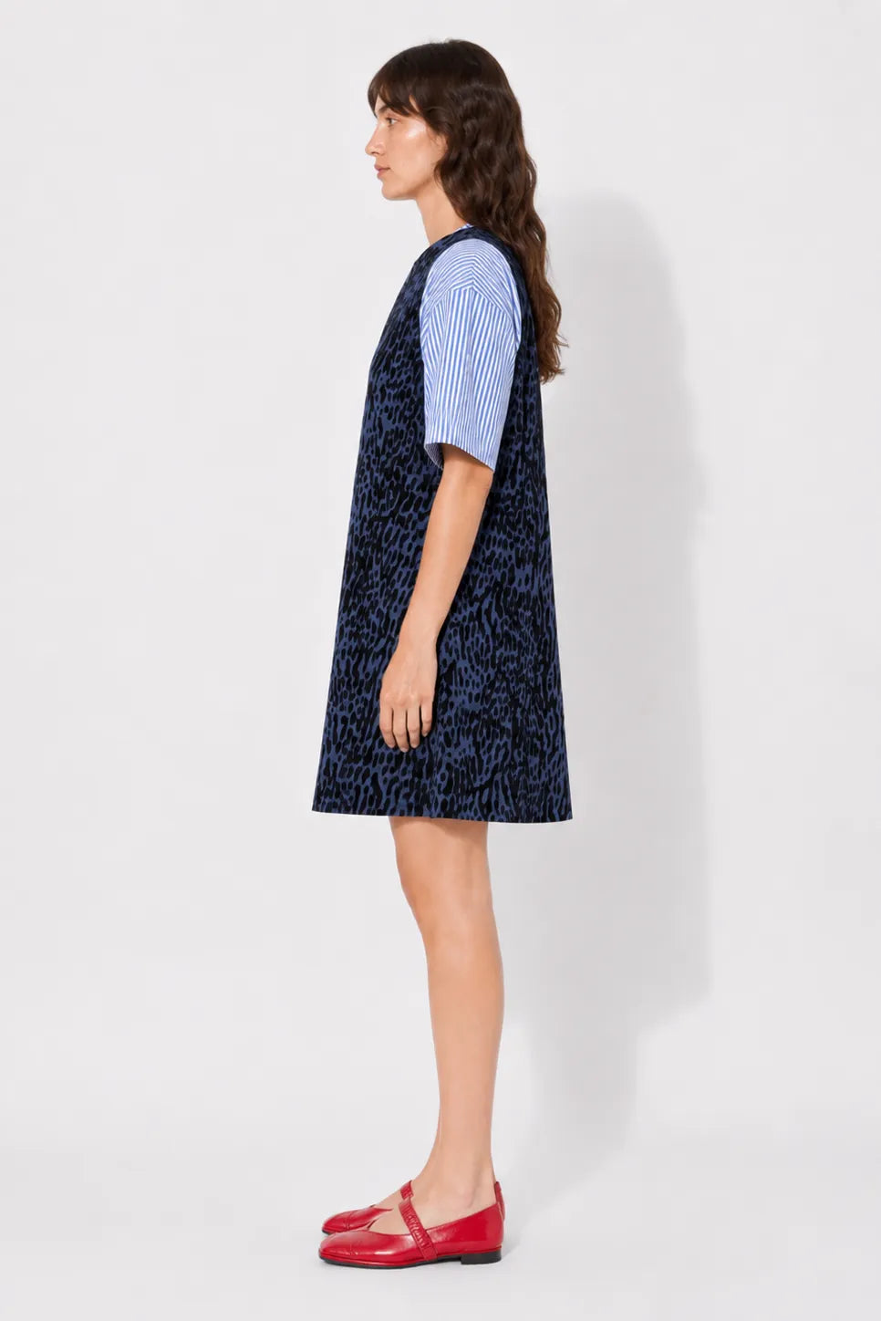 Side view of the STEF SERIES Cenny sleeveless mini dress in denim with velvet leopard print.