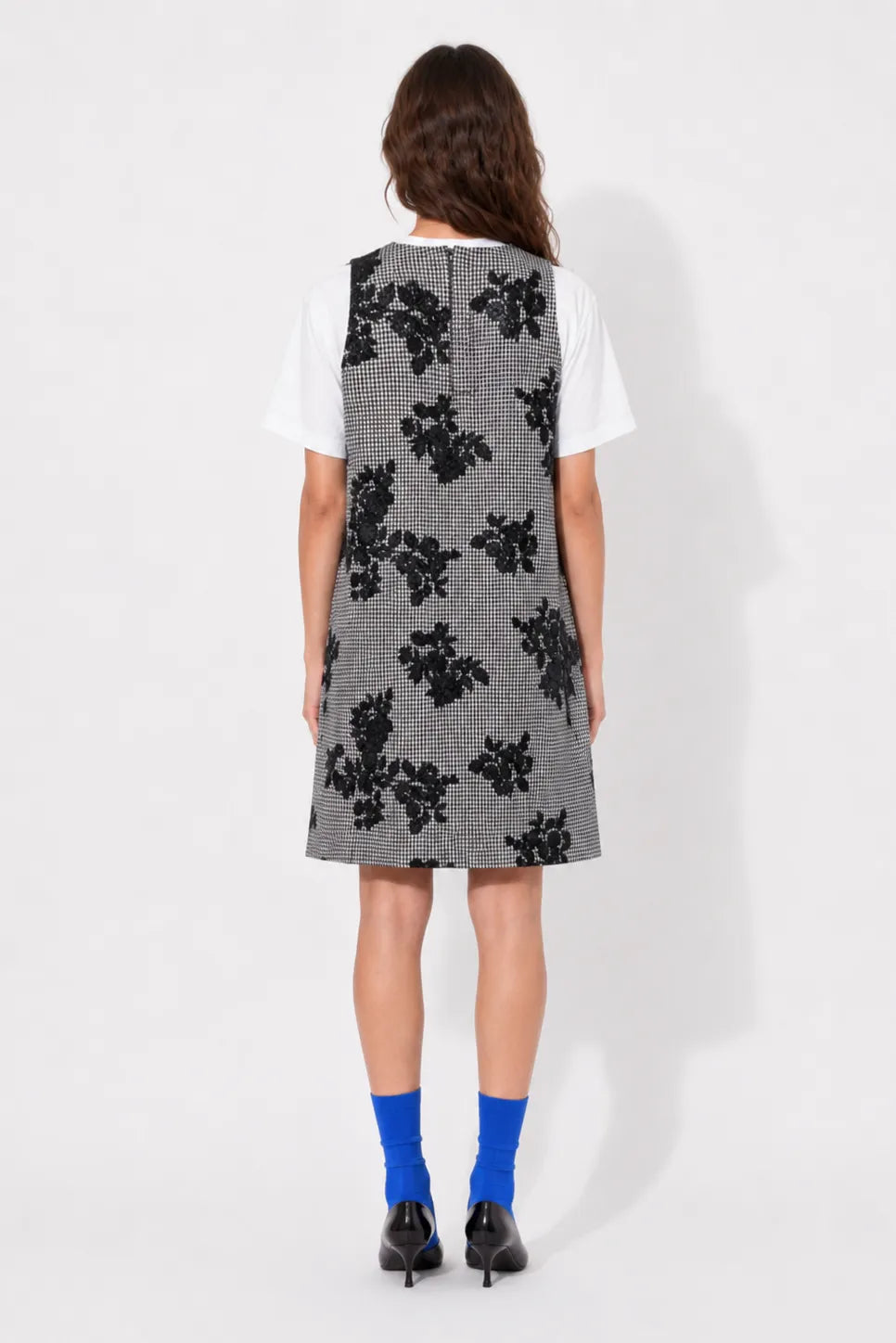 Back view of the STEF SERIES Cenny sleeveless mini dress in pied-de-poule.
