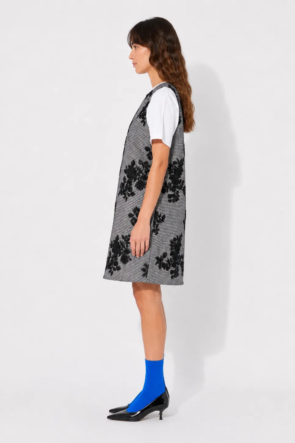 Side view of the STEF SERIES Cenny sleeveless mini dress in pied-de-poule.