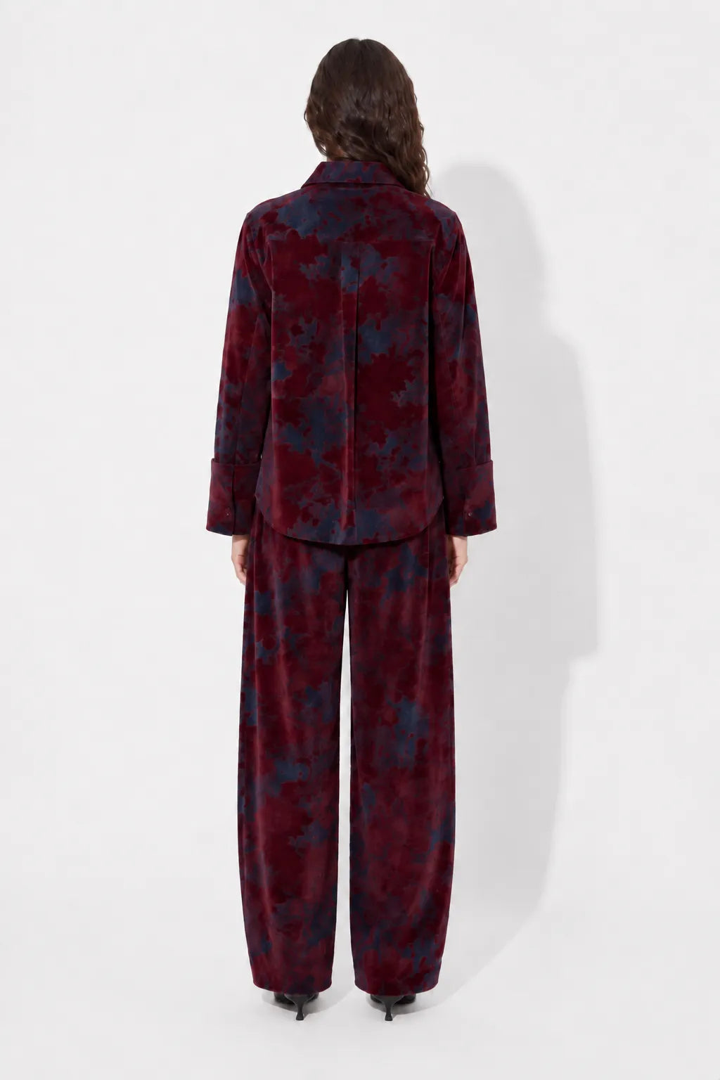 Back view of the STEF SERIES Chuck barrel-shaped pants crafted from bordeaux velvet denim.