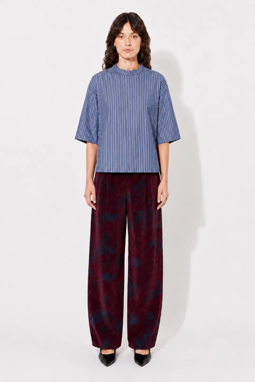 Front view of the STEF SERIES Chuck barrel-shaped pants crafted from bordeaux velvet denim.