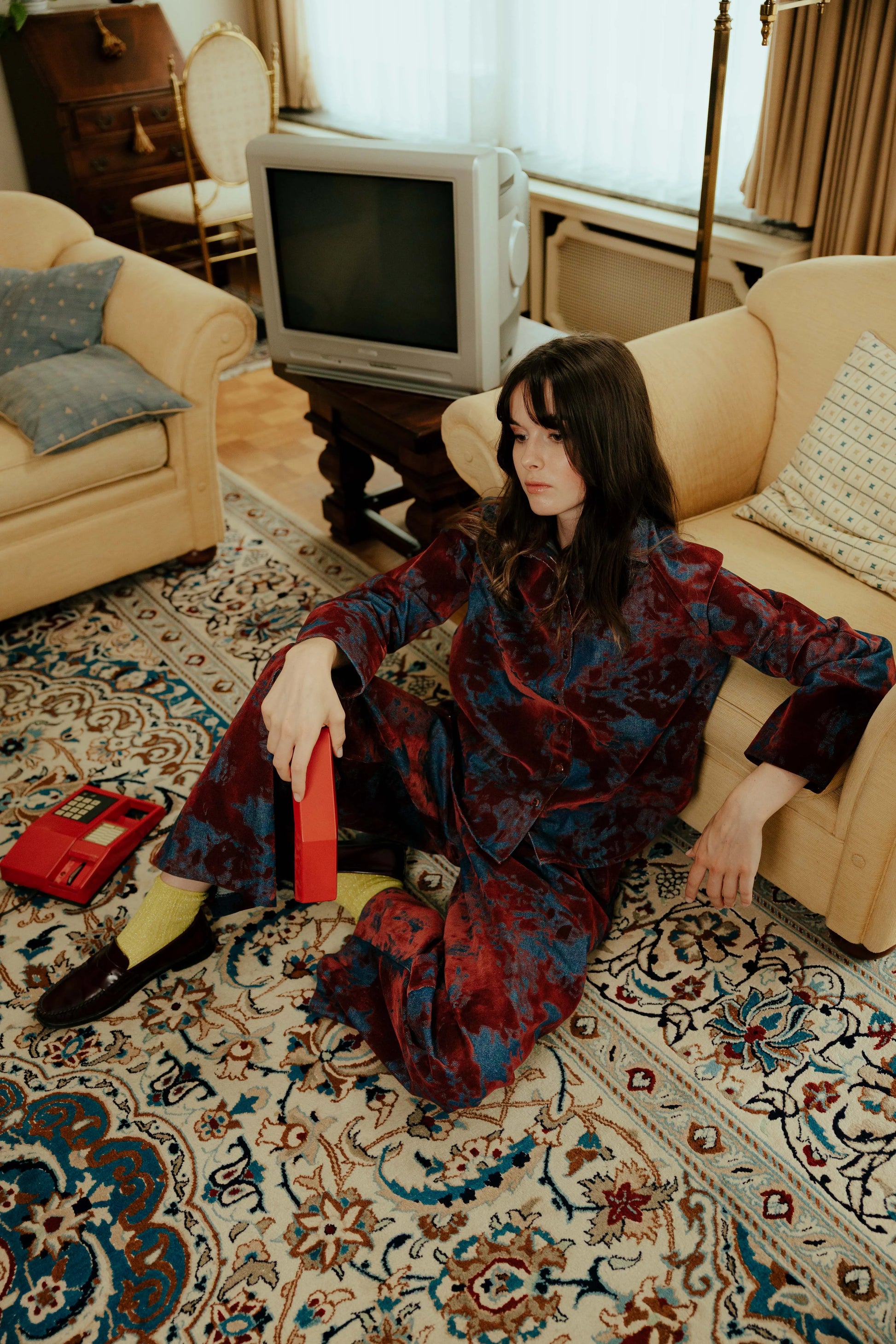Model wearing the STEF SERIES Chuck barrel pants with the Coby shirt, both crafted from bordeaux velvet denim. Part of the Autumn Winter 2026 Collection.