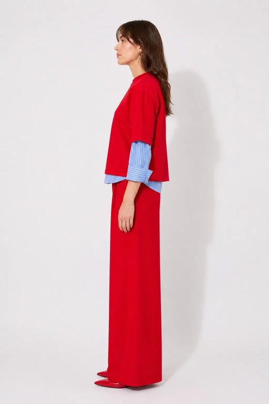 Side view of the STEF SERIES Ciska boxy T-shirt crafted from red velvet.