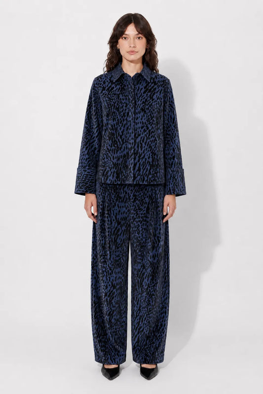 Front view of the STEF SERIES Coby long sleeve denim shirt with a velvet leopard print.