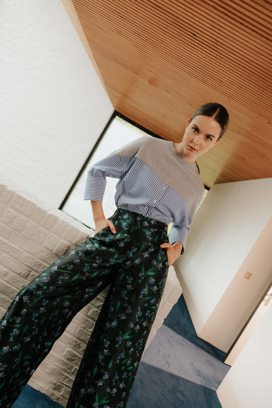 Front view of the STEF SERIES Collin poplin shirt in blue stripes, styled with the Caro blue floral wide-leg pants.