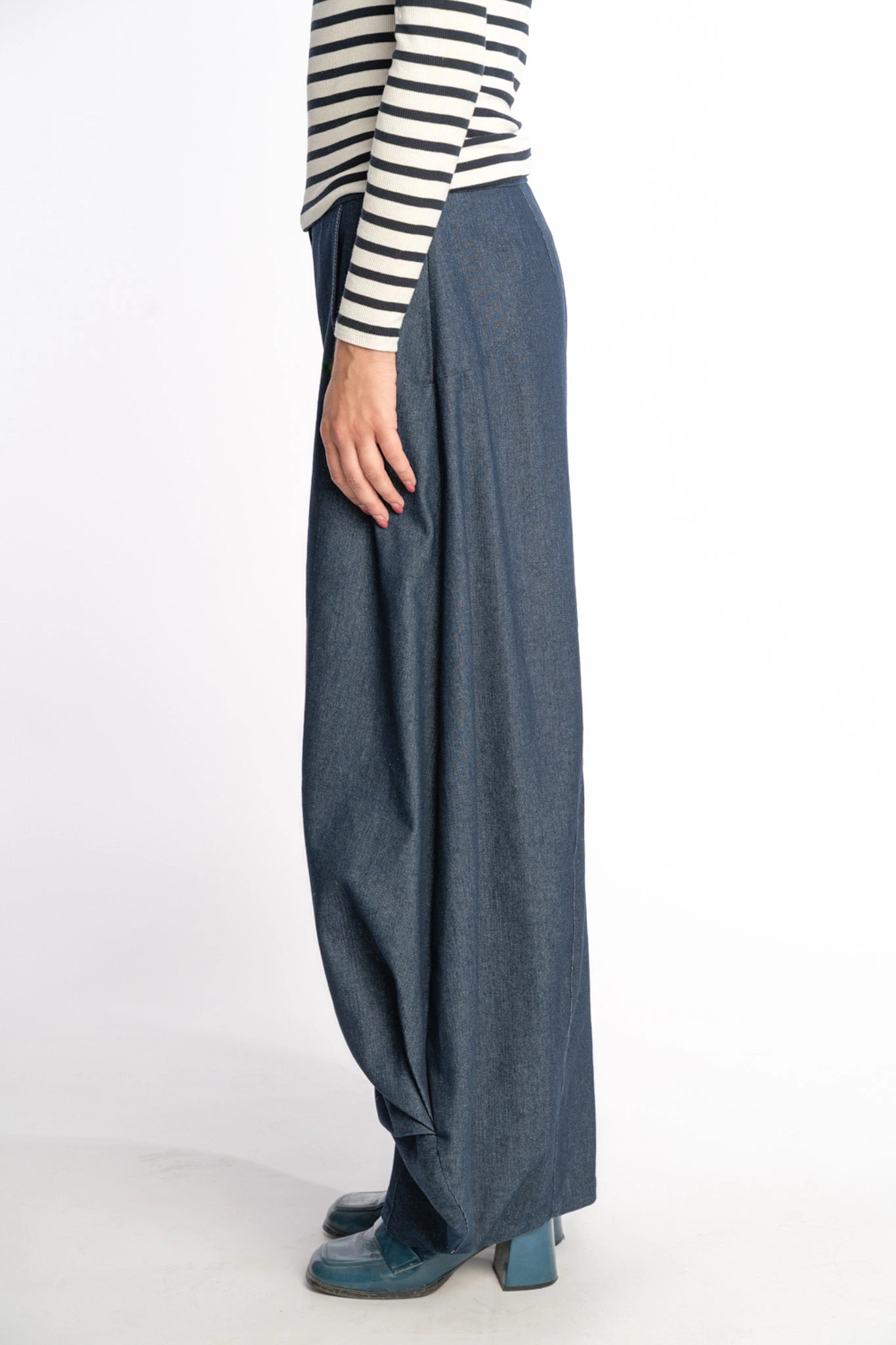 Denim wide leg draped pants Alex in indigo denim from the STEF SERIES Limited Autumn Winter Collection 2025, shown from side.