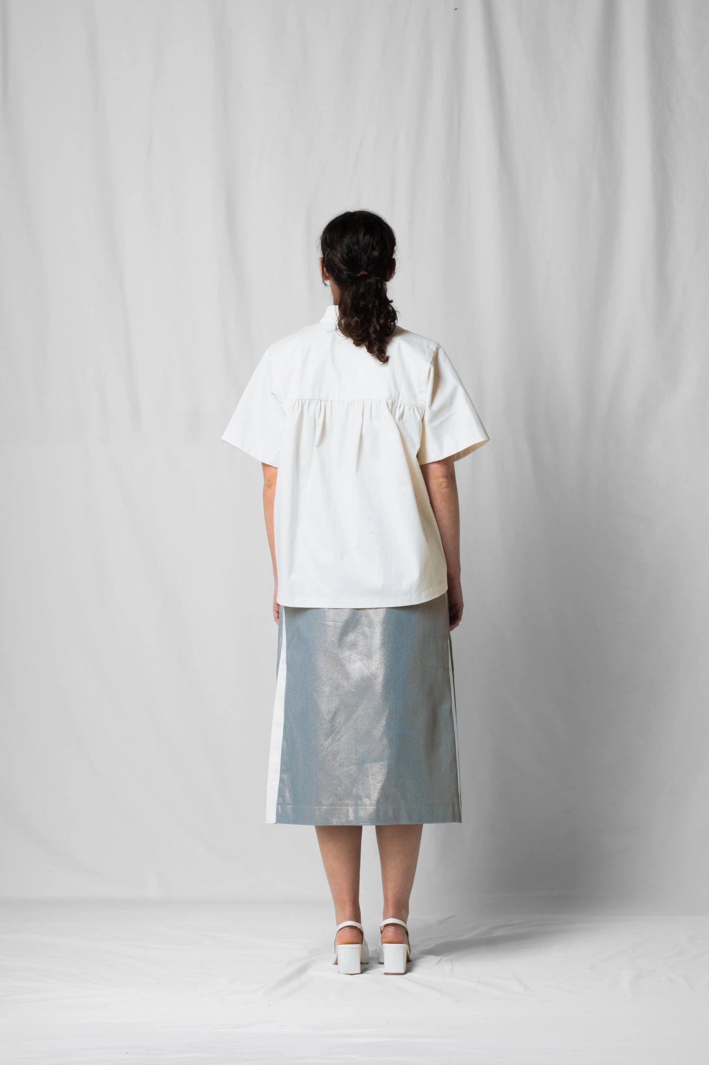 Knee-length midi Asil skirt shiny denim with Slits at the side from the SS26 collection by STEF SERIES