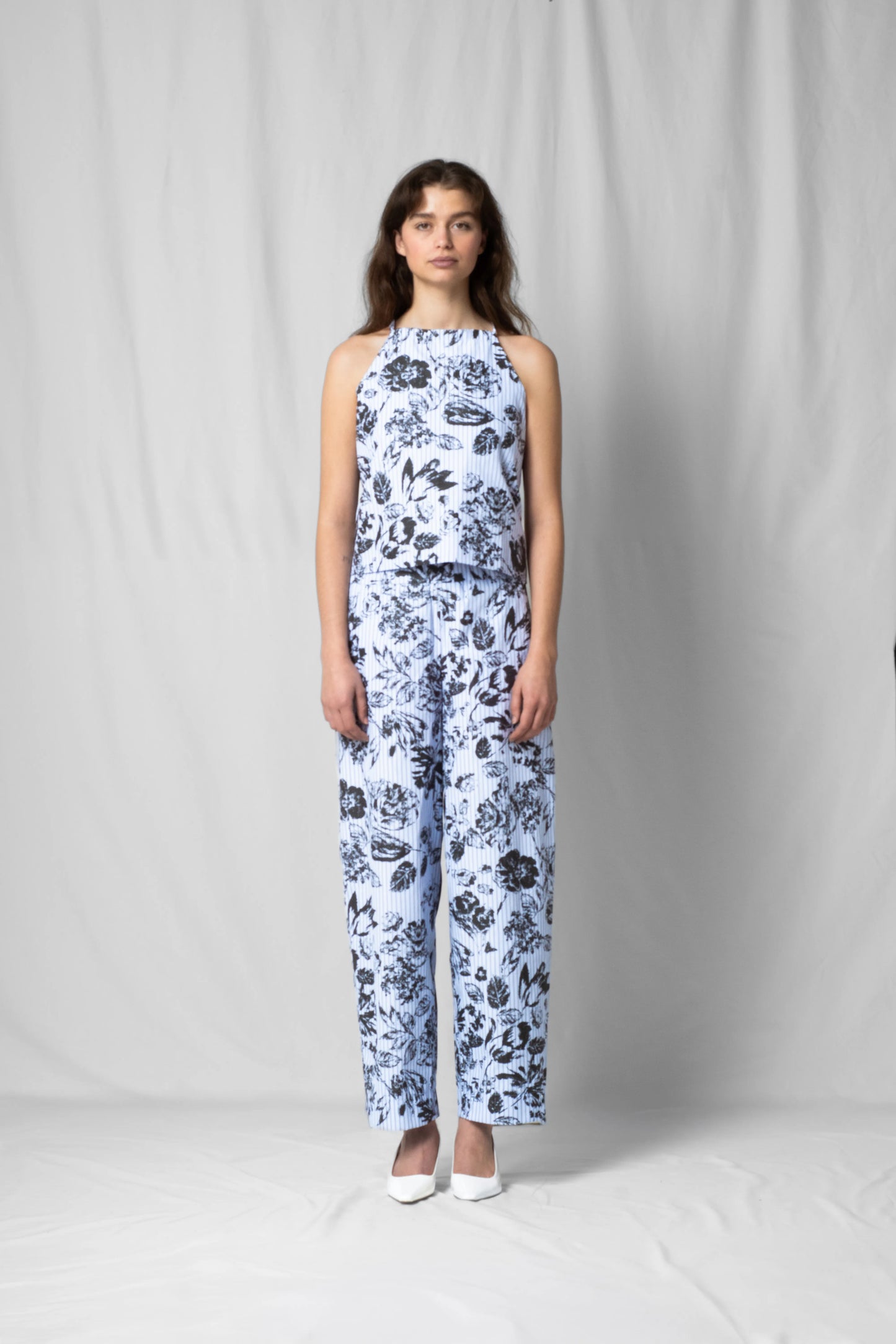 Model wearing black flowers balloon shaped Bash pants from the limited edition SS26 collection by STEF SERIES.