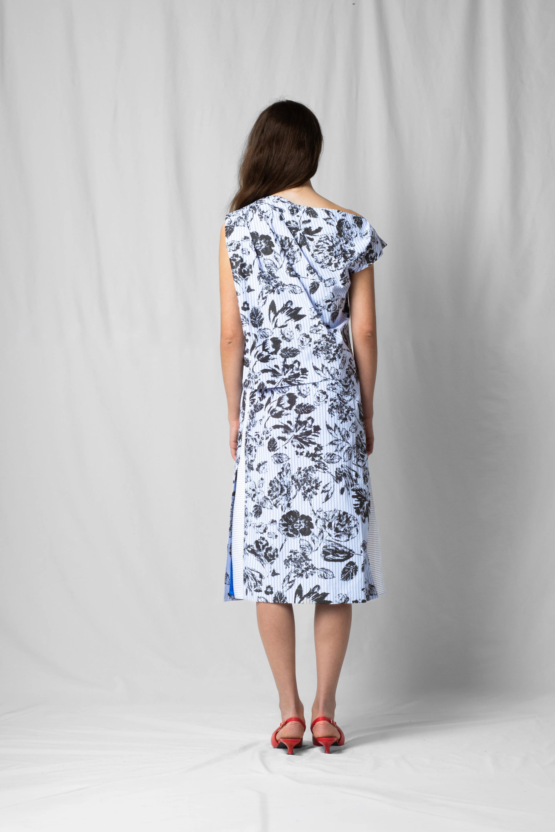 Black flowers Asymmetric off-shoulder top bea with pleated detailing from the SS26 collection by STEF SERIES