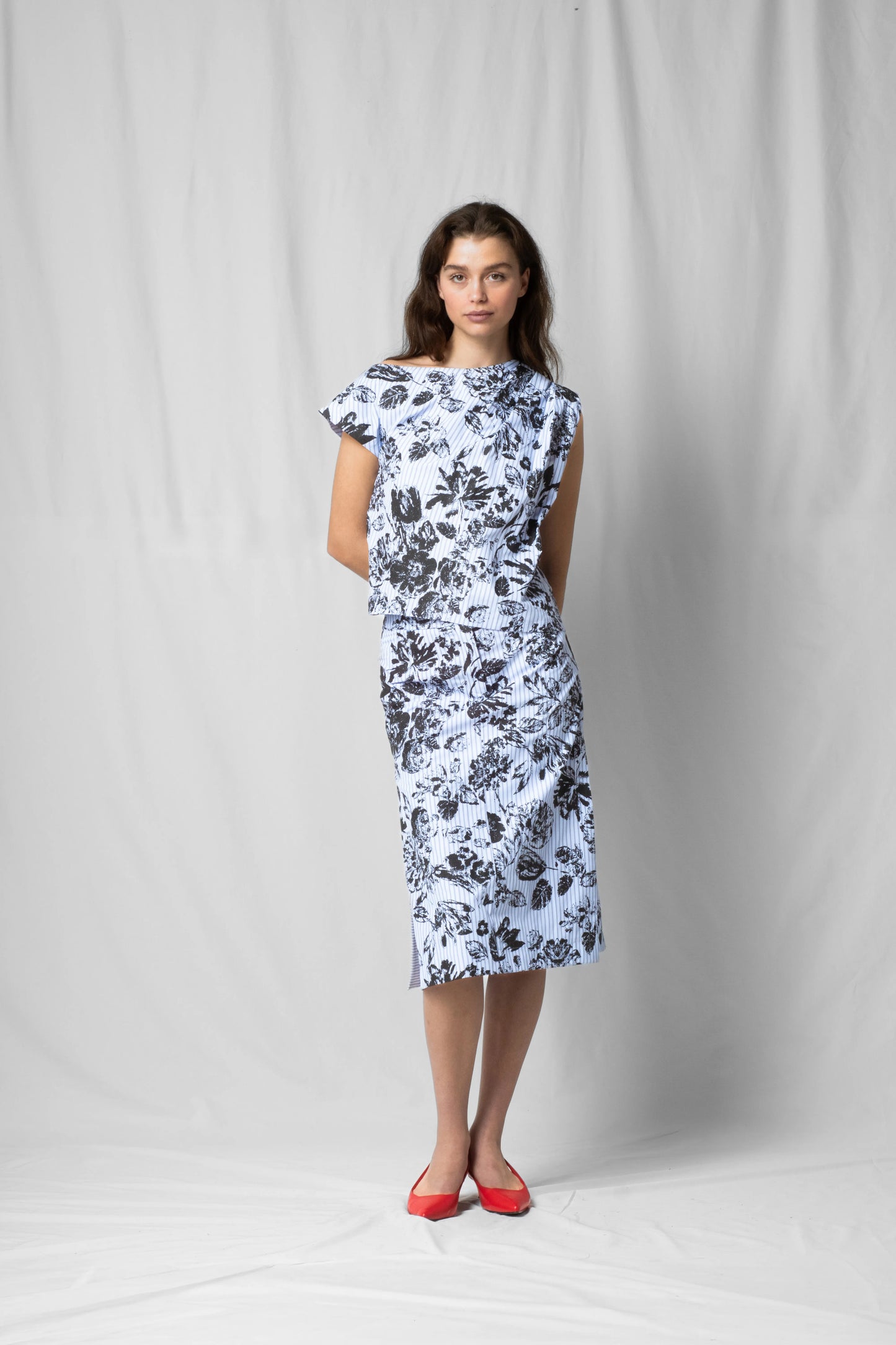 black flowers Asymmetric off-shoulder top bea with pleated detailing from the SS26 collection by STEF SERIES