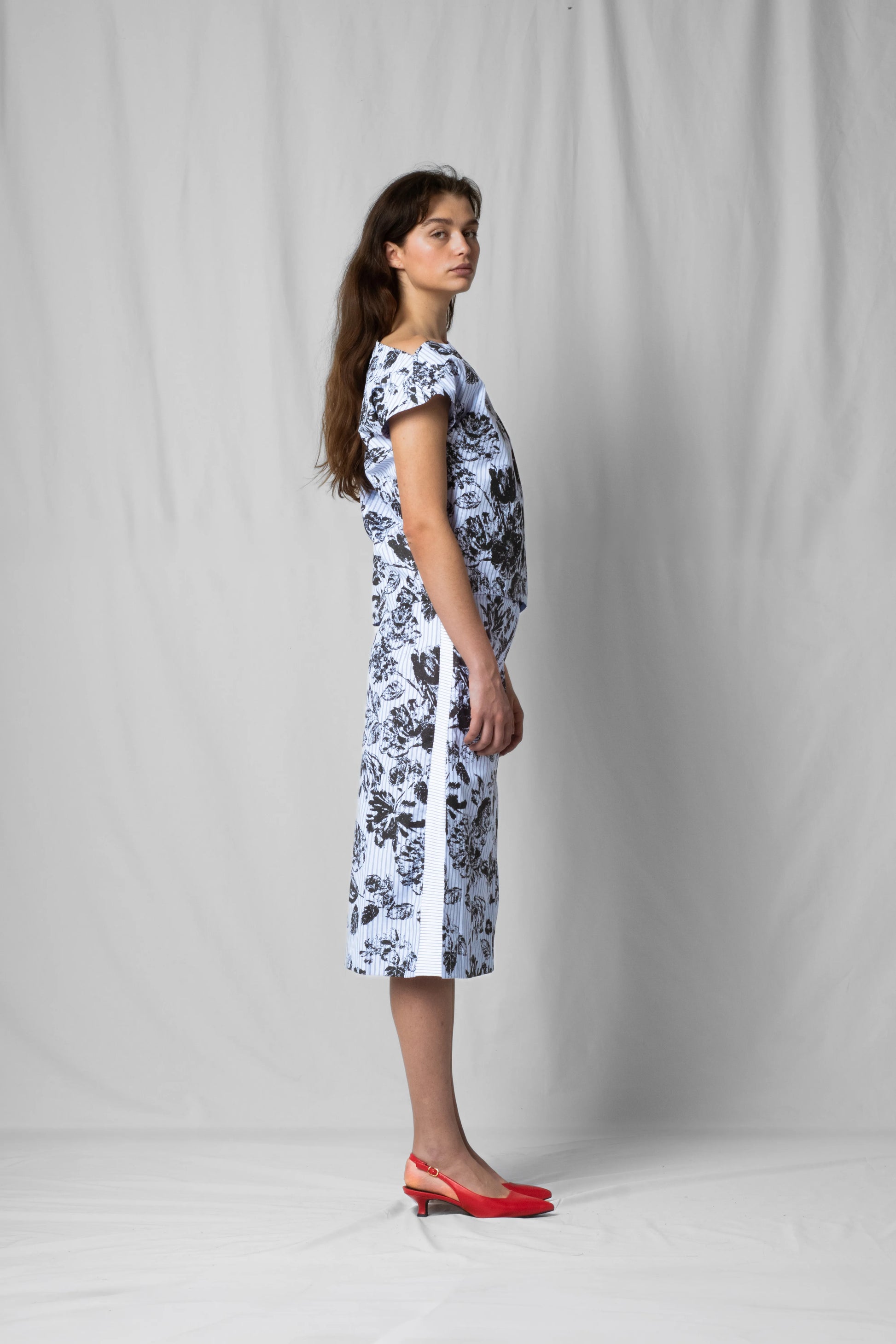 black flowers Asymmetric off-shoulder top bea with pleated detailing from the SS26 collection by STEF SERIES