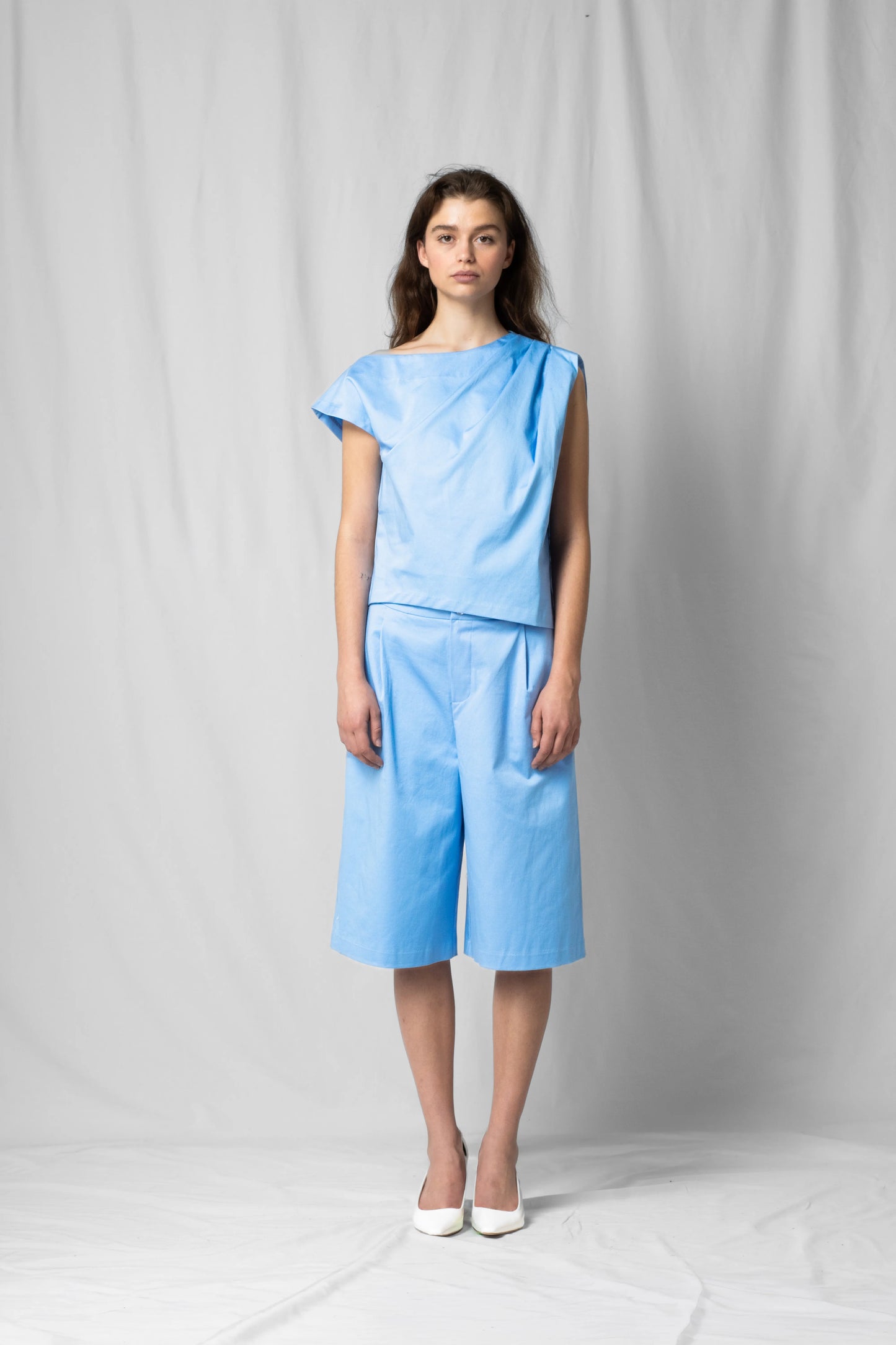Ciel blue Asymmetric off-shoulder top bea with pleated detailing from the SS26 collection by STEF SERIES