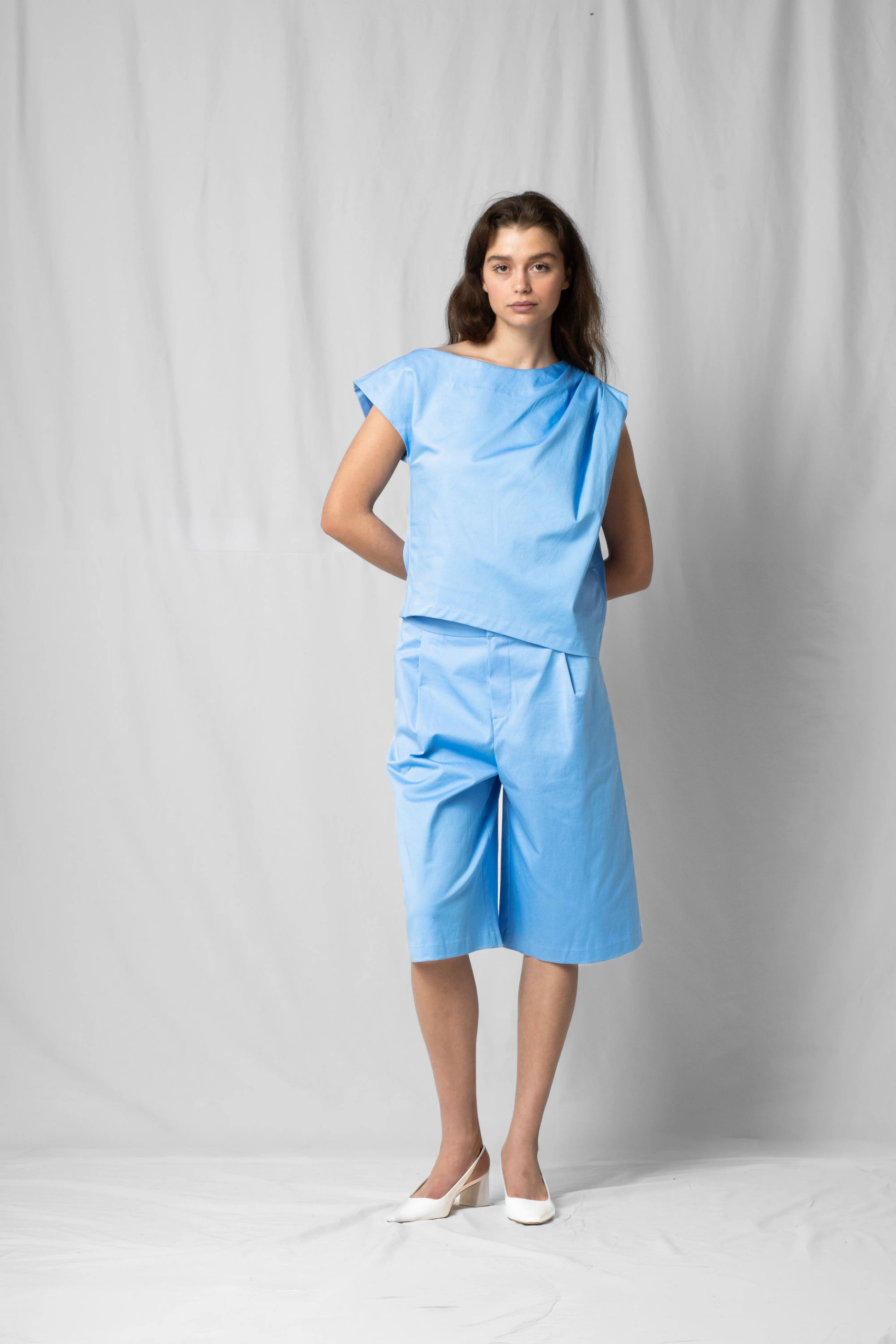 Ciel blue Asymmetric off-shoulder top bea with pleated detailing from the SS26 collection by STEF SERIES