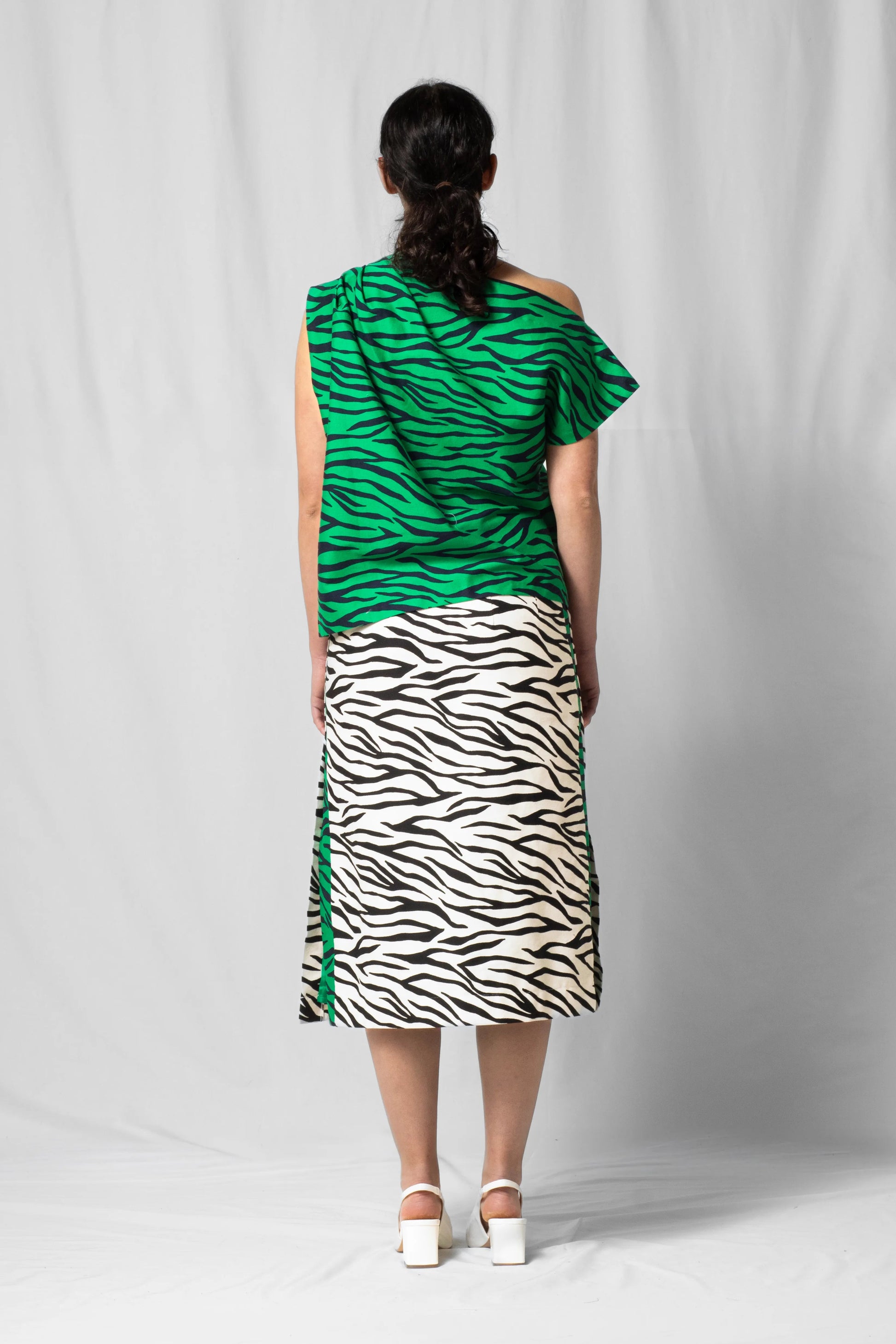 Green zebra Asymmetric off-shoulder top bea with pleated detailing from the SS26 collection by STEF SERIES