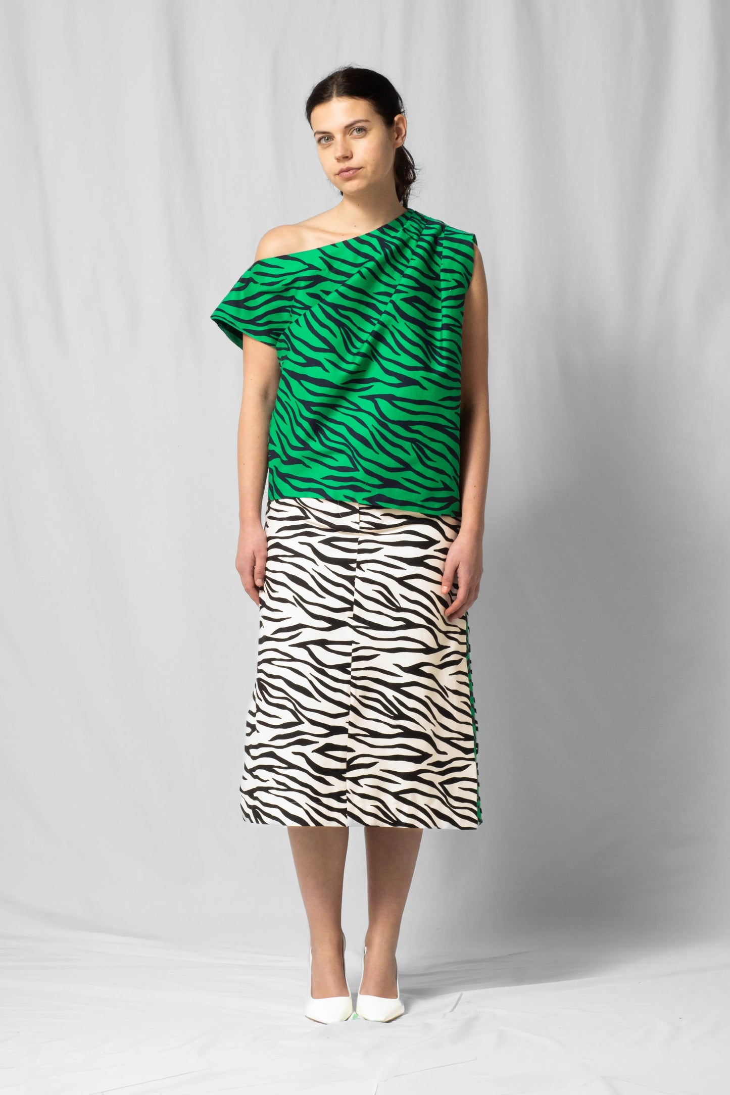 Green zebra Asymmetric off-shoulder top bea with pleated detailing from the SS26 collection by STEF SERIES
