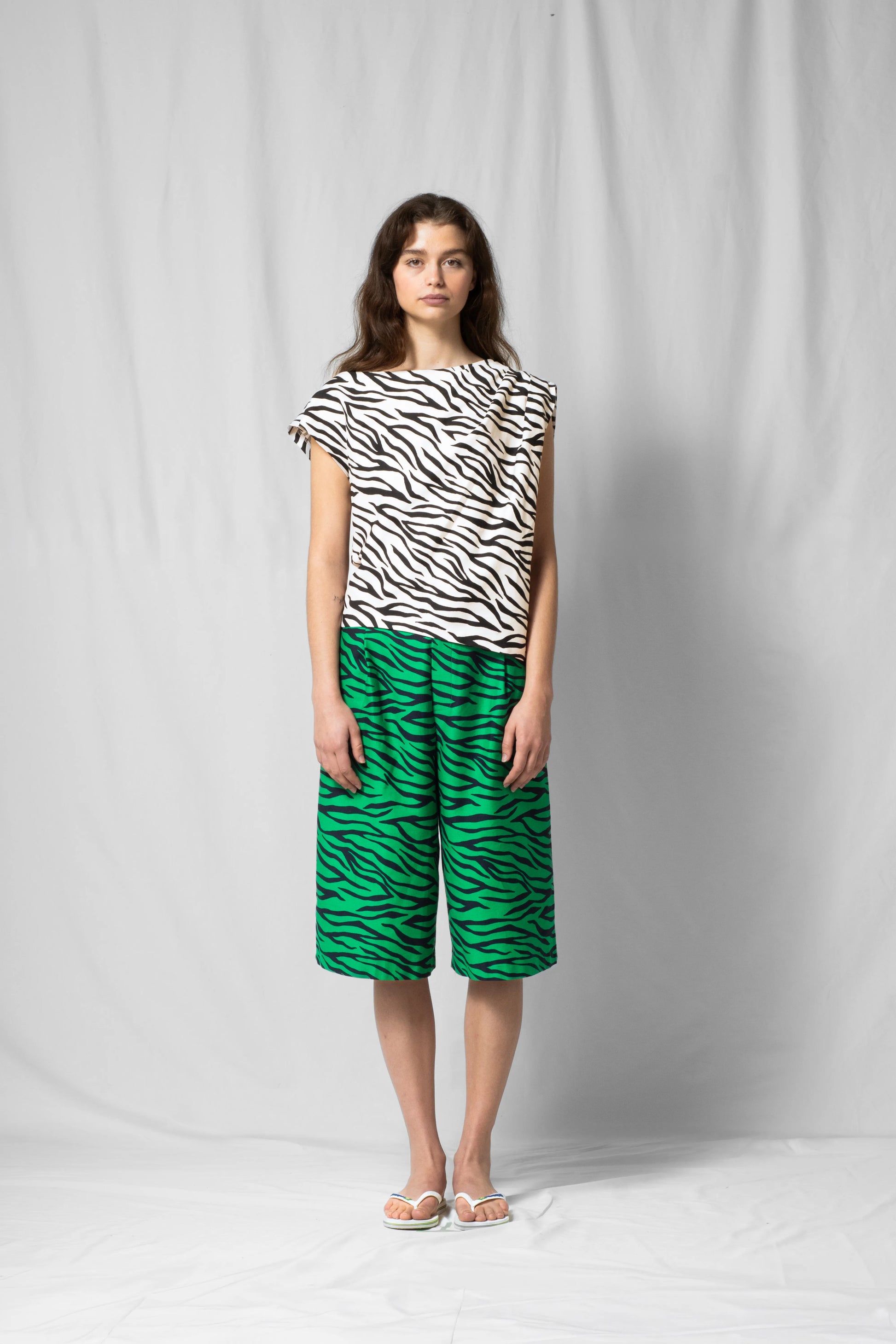 White zebra Asymmetric off-shoulder top bea with pleated detailing from the SS26 collection by STEF SERIES