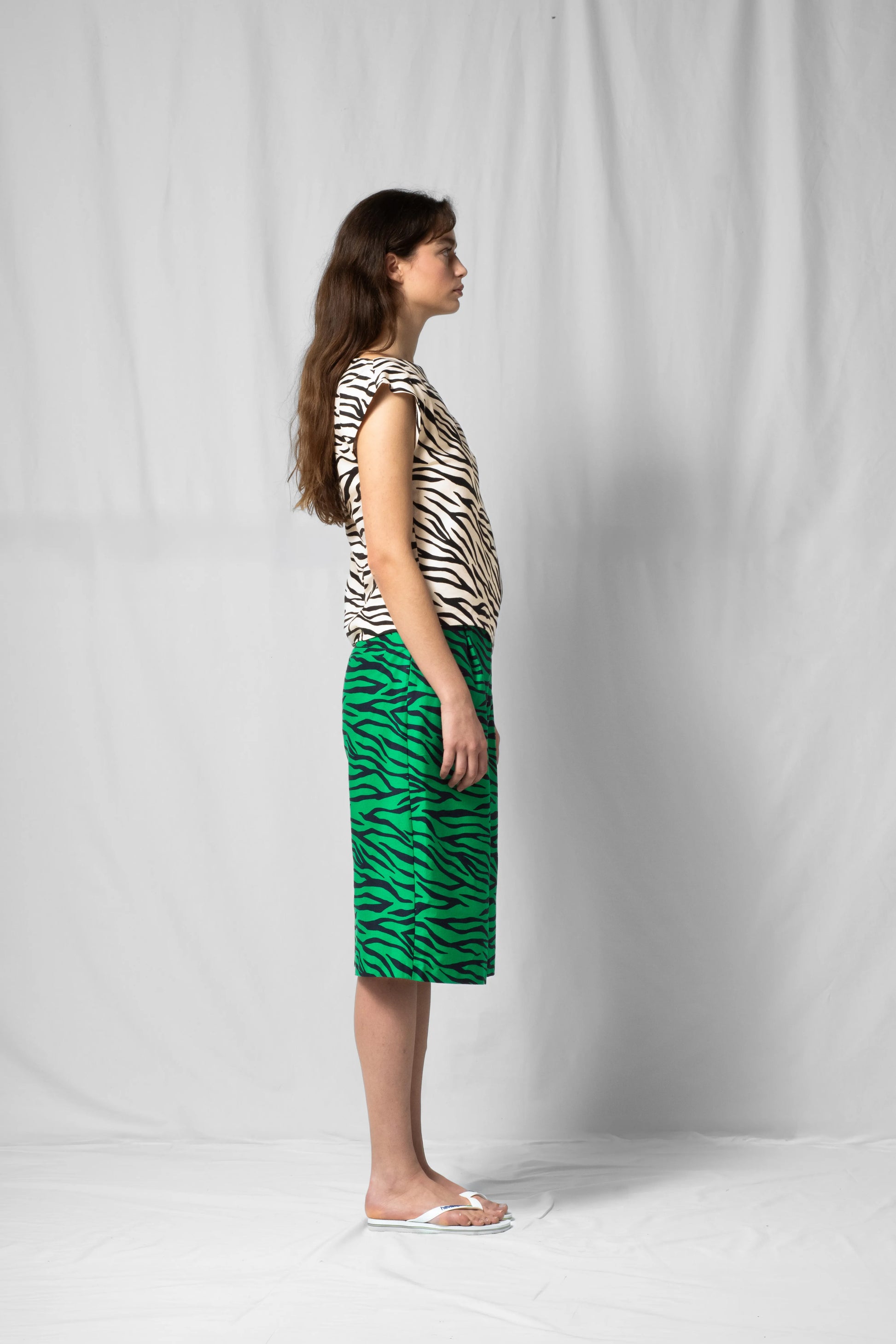 White zebra Asymmetric off-shoulder top bea with pleated detailing from the SS26 collection by STEF SERIES