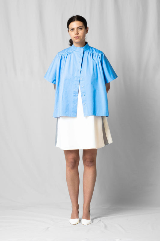Ciel blue short-sleeve Bowie shirt with button fastening and gathered detailing from the SS26 collection by STEF SERIES shown from the front.