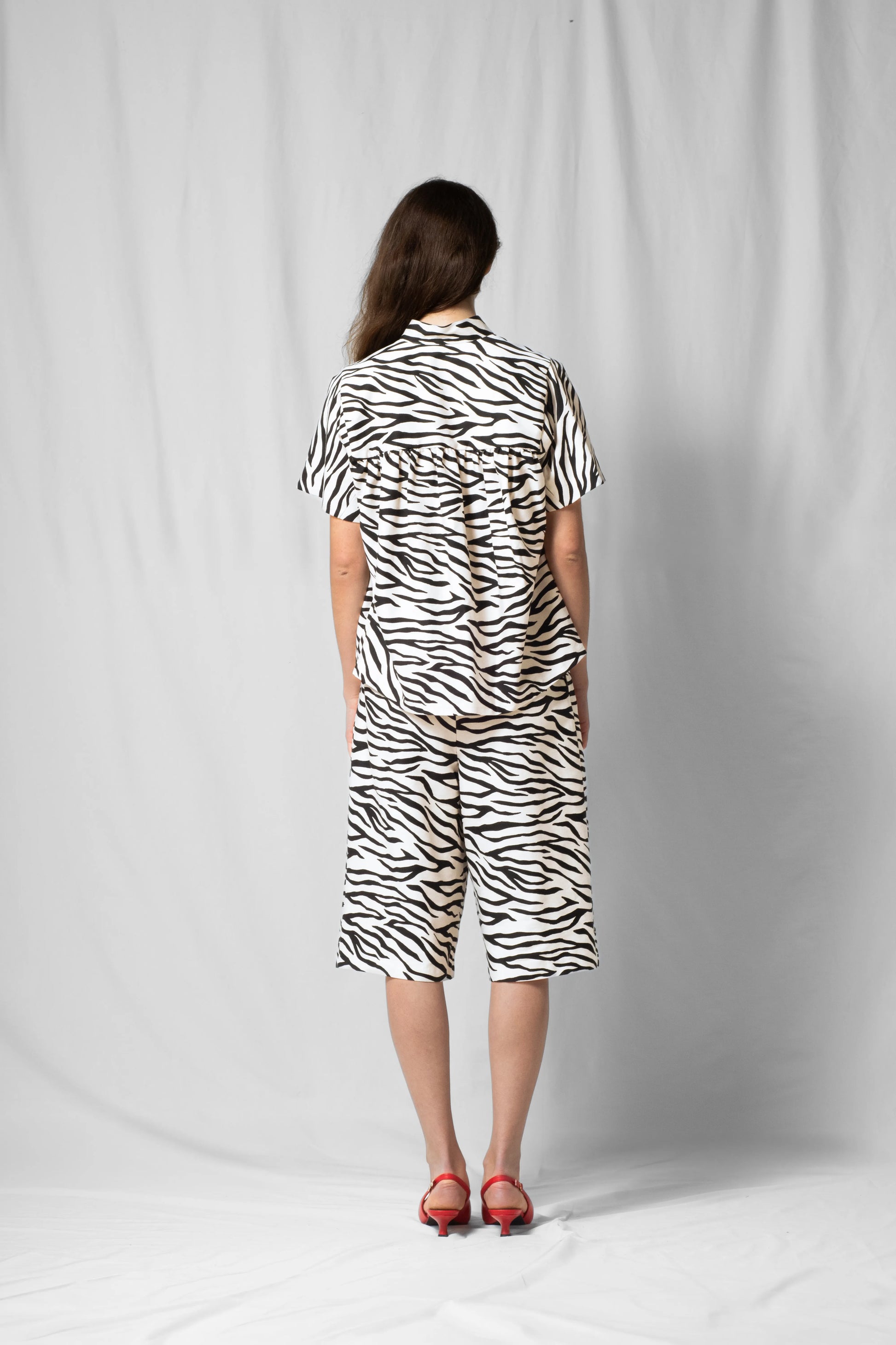 White zebra Short-sleeve bowie shirt with button fastening and gathered detailing from the SS26 collection by STEF SERIES