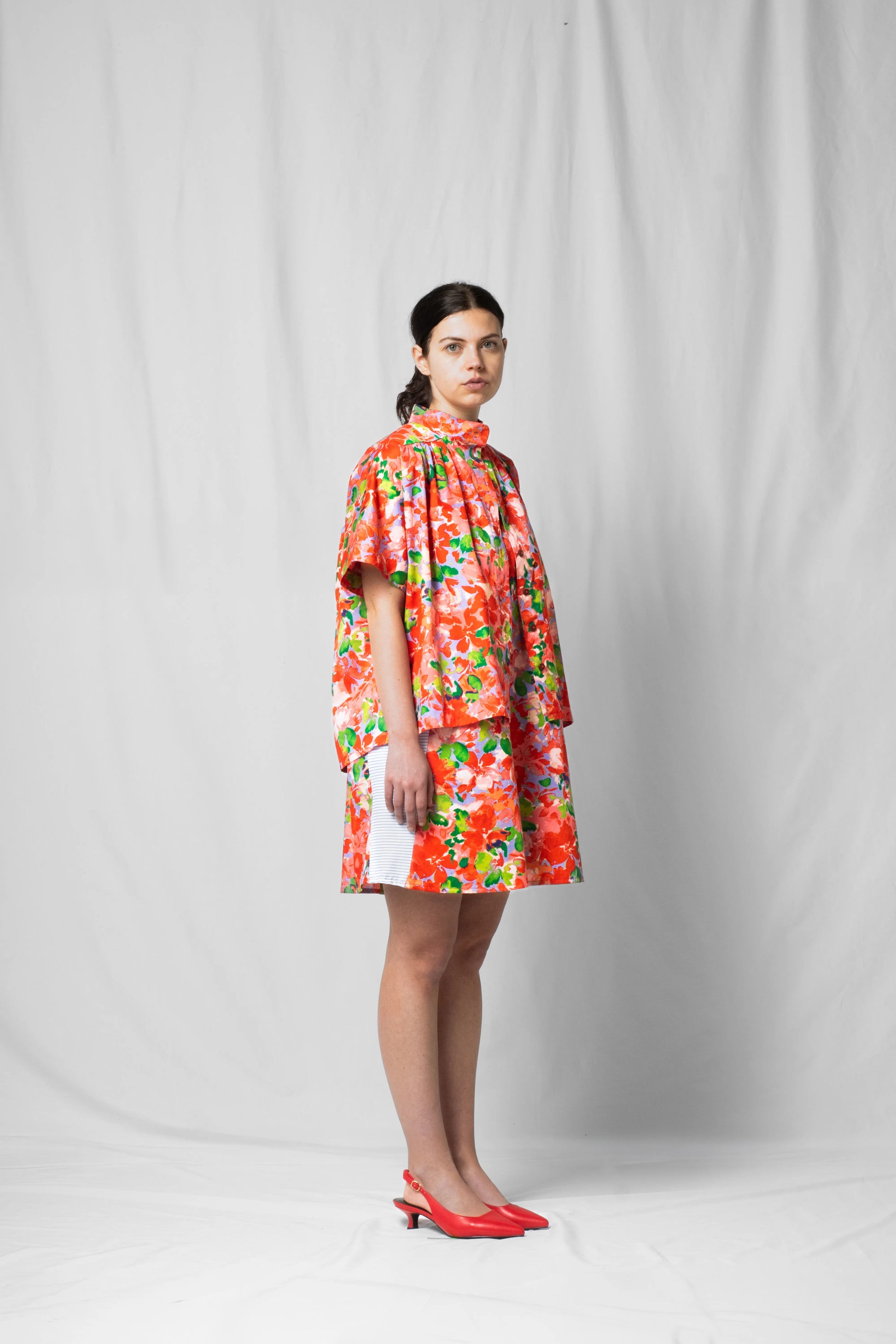 Model showing the pink flowers short-sleeve Bowie shirt from the limited SS26 collection by STEF SERIES.