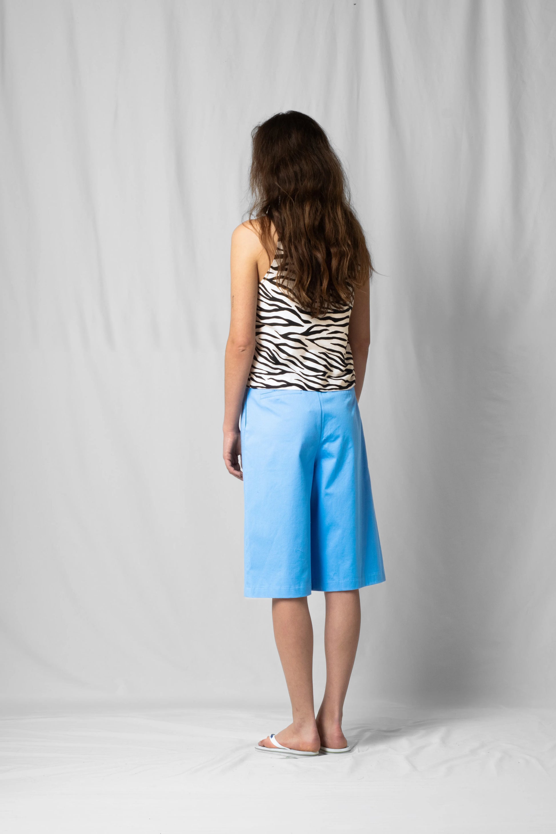 ciel blue wide-leg bran bermuda shorts with pockets and zip closure from the SS26 collection by STEF SERIES