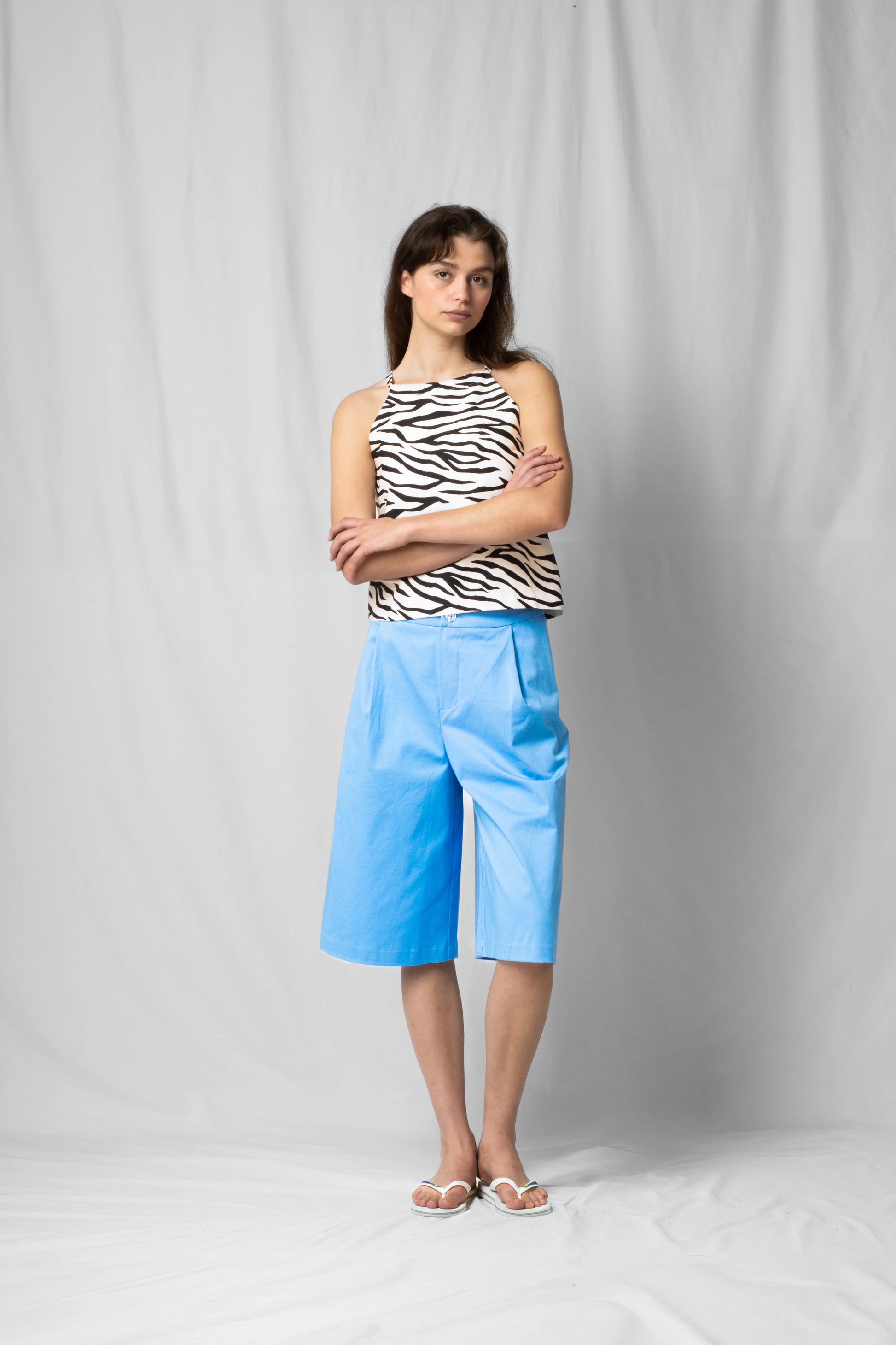 ciel blue wide-leg bran bermuda shorts with pockets and zip closure from the SS26 collection by STEF SERIES