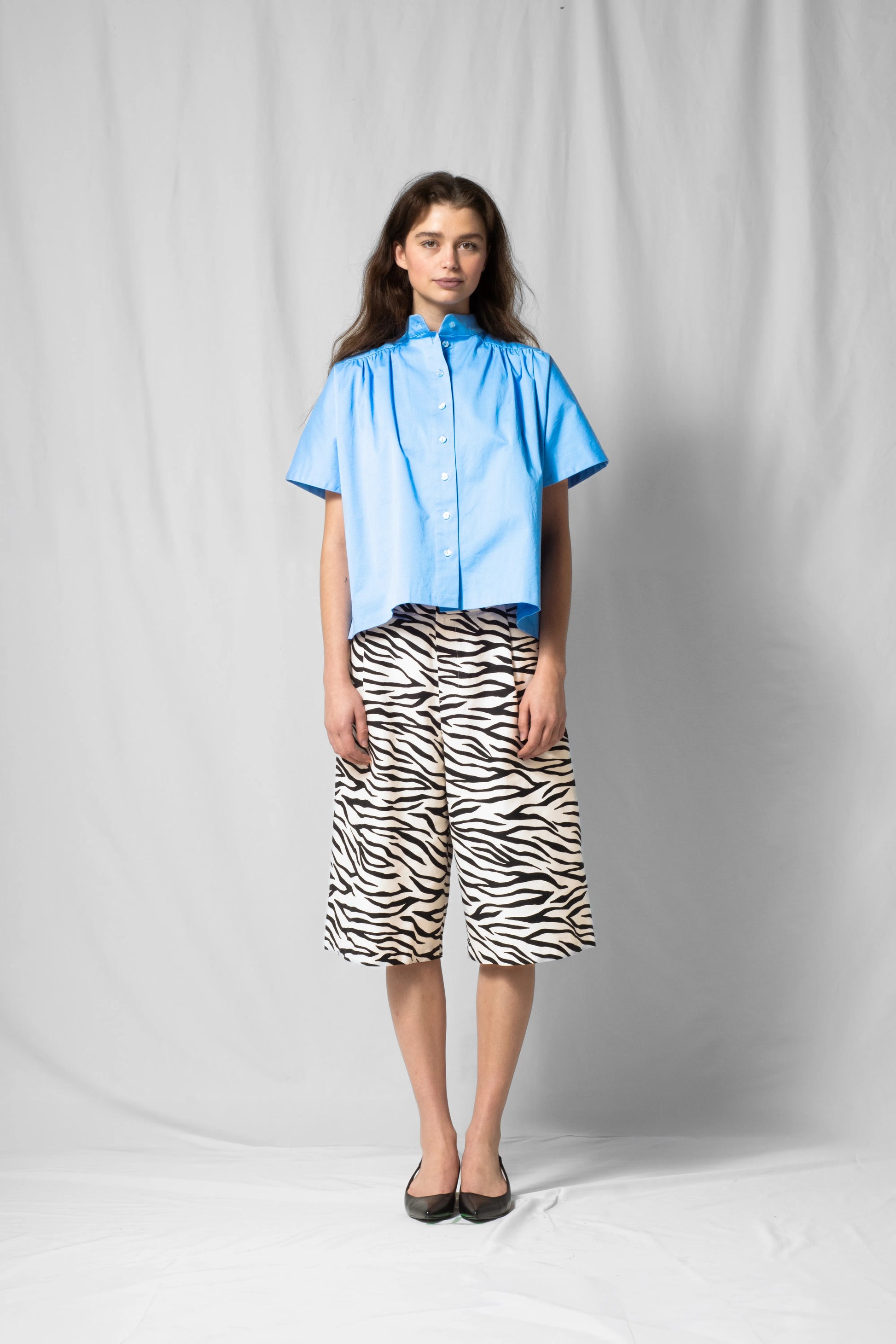 white zebra wide-leg bran bermuda shorts with pockets and zip closure from the SS26 collection by STEF SERIES